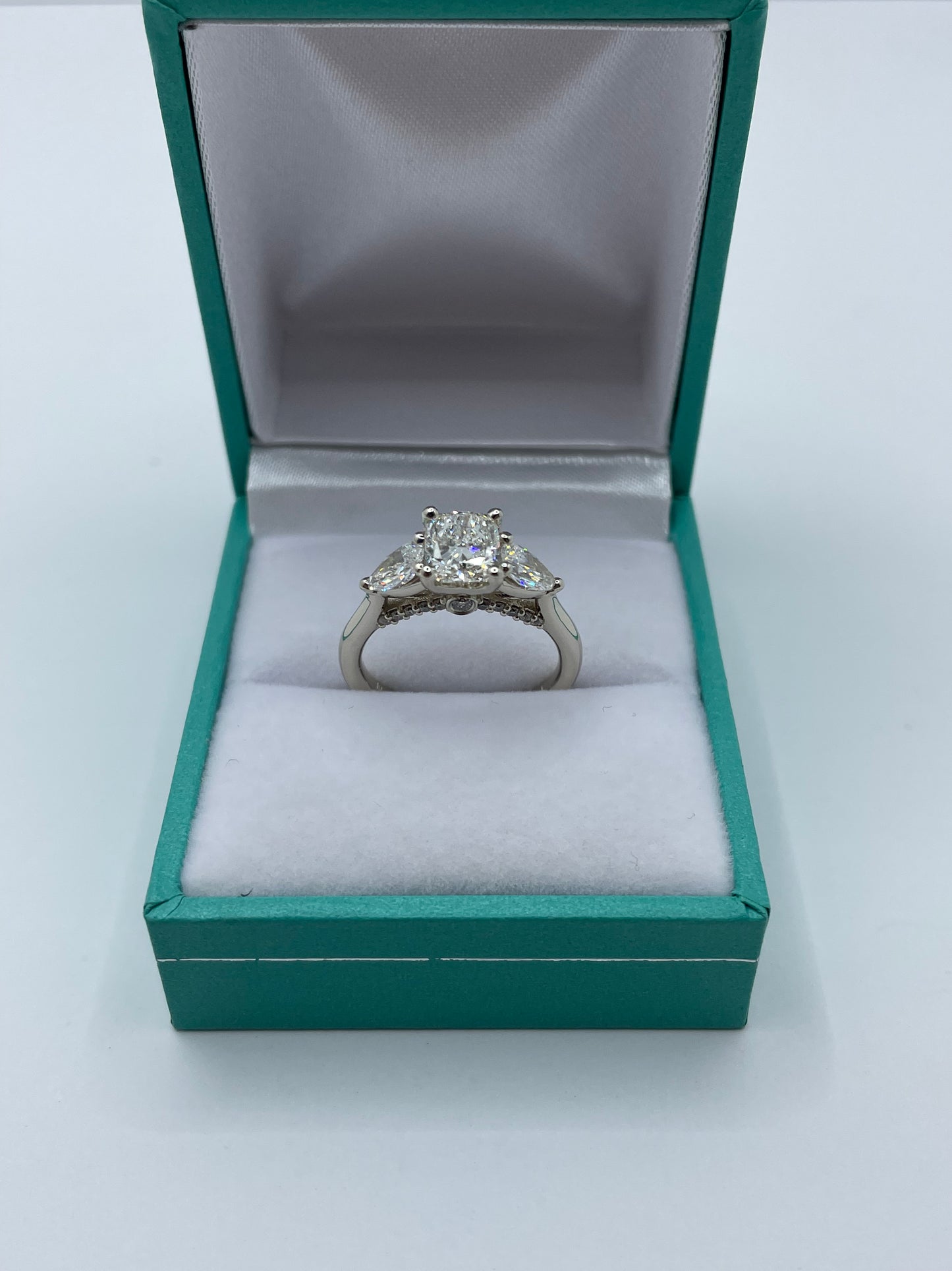 14k White Gold Cushion Cut Center Stone Ring with 2 pear cut stones